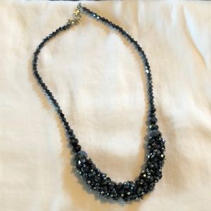 Cool necklace with black-blue stones.